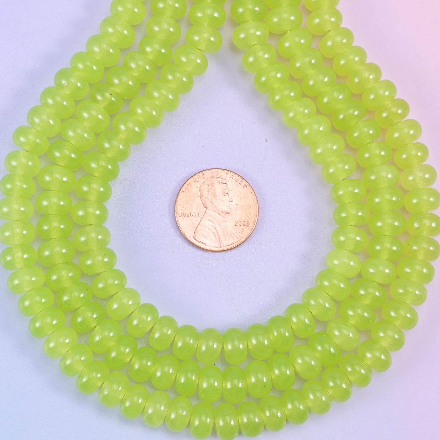 Lime Green Dyed Jade smooth rondelle beads in a bright, juicy lime green, finished with a smooth, polished surface
