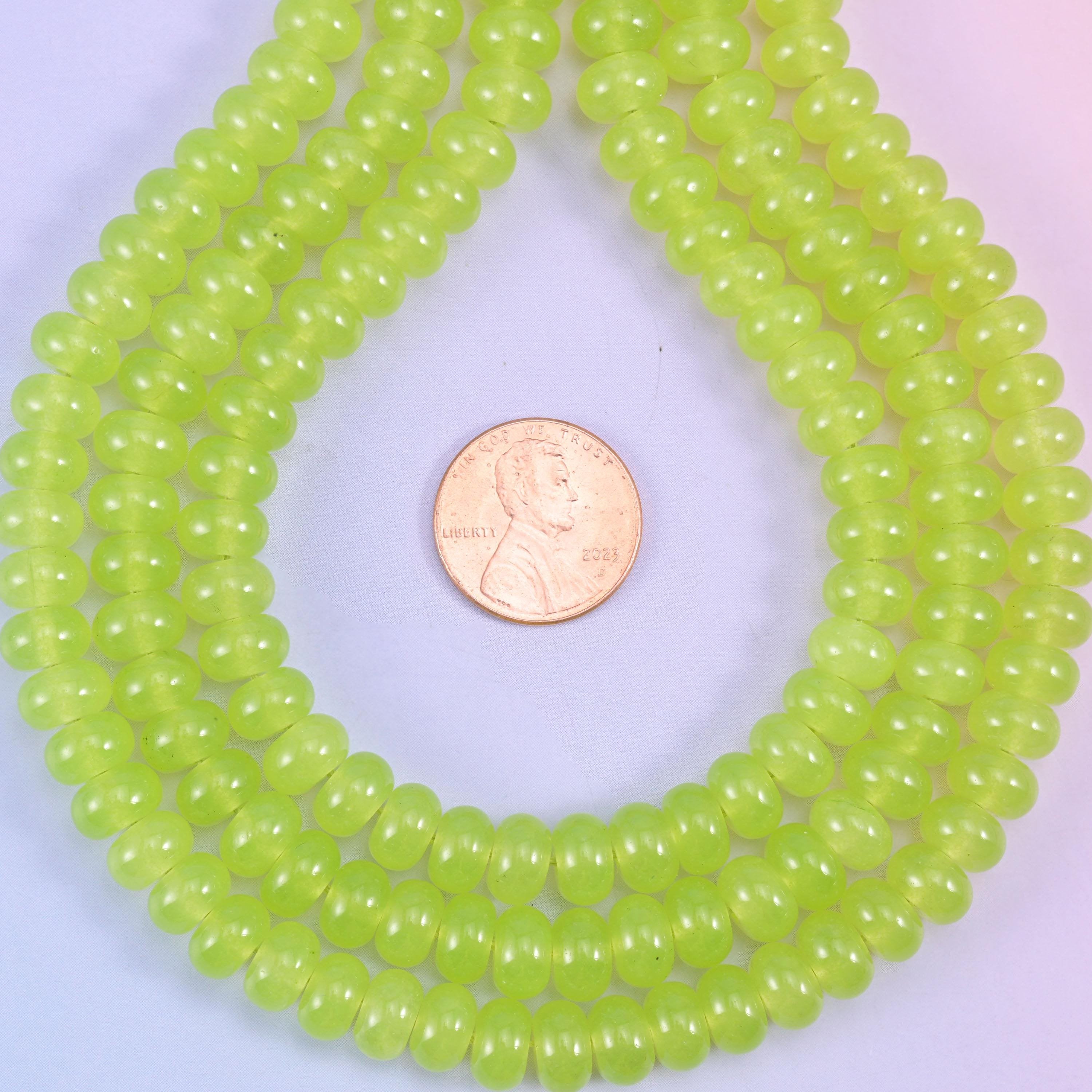 Lime Green Dyed Jade smooth rondelle beads in a bright, juicy lime green, finished with a smooth, polished surface