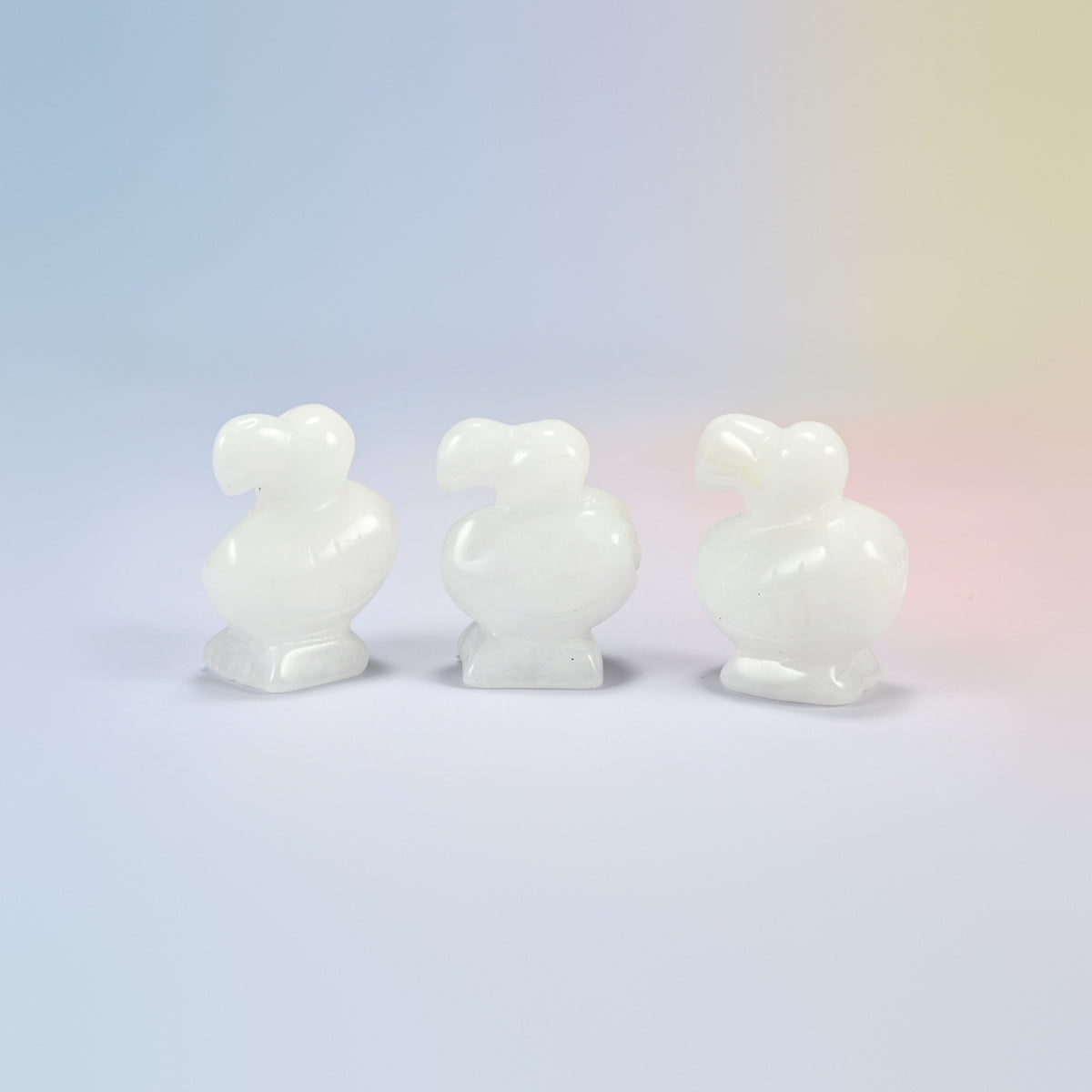 Three white jade dodo bird crystal carvings, 1.5 inch, milky white natural stone