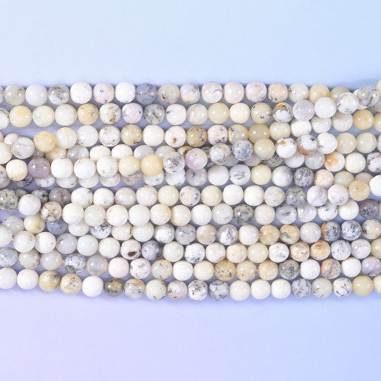 Smooth round cut white opal beads