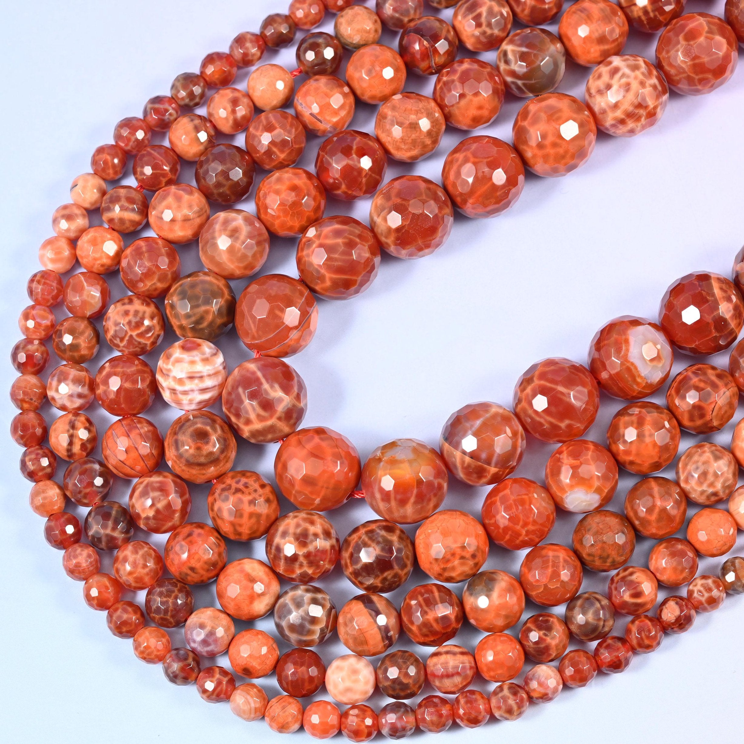 Faceted round cut Fire Agate beads