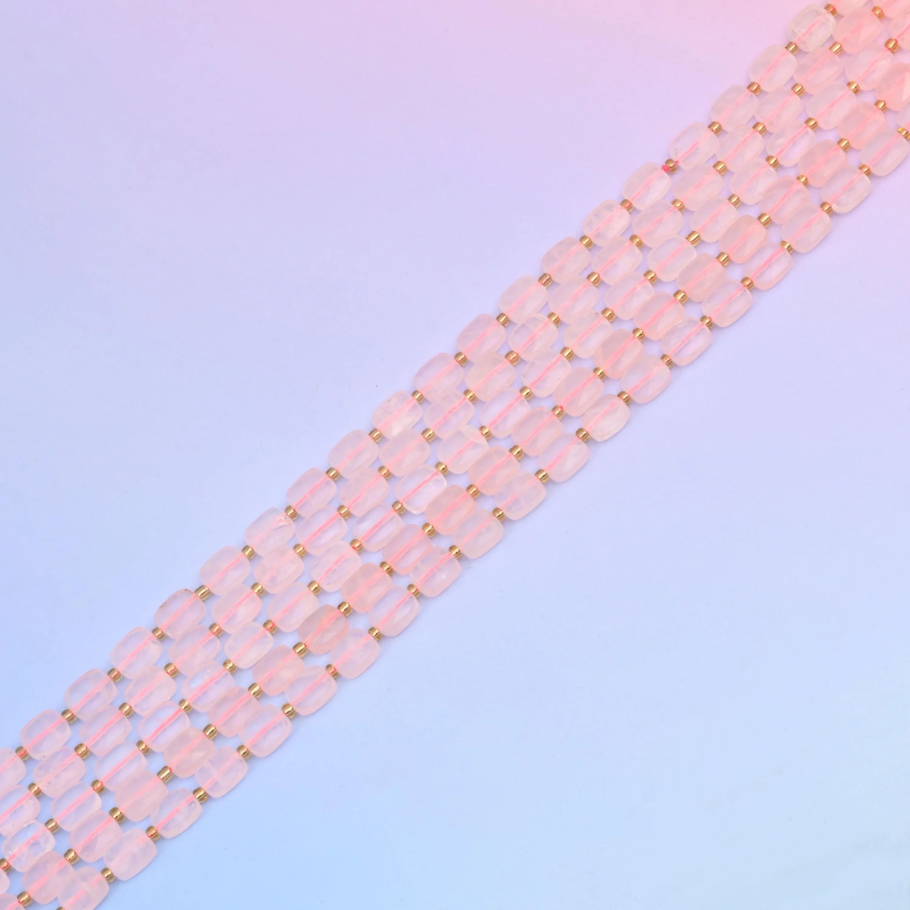 Rose quartz beads in pale blush pink tones