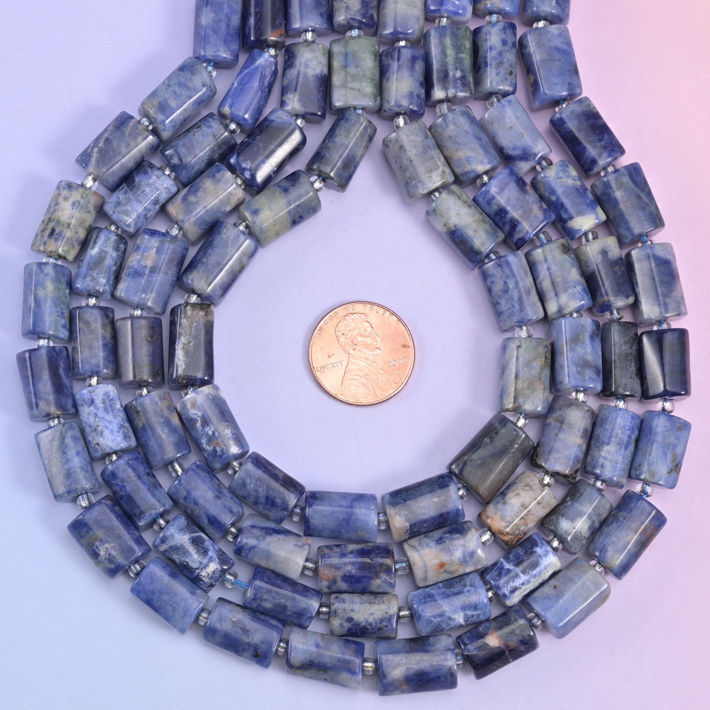 Natural Sodalite faceted tube cylinder beads, a rich blue color with a faceted shape