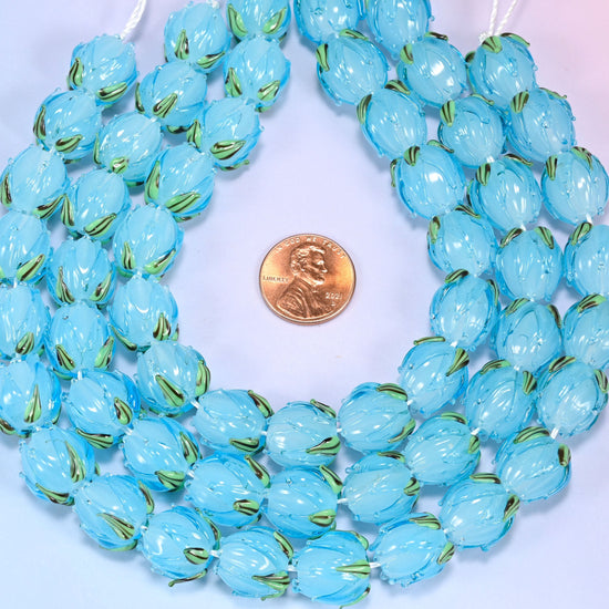 Sky blue tulip flower bud lampwork glass beads, approximately 20 beads per strand
