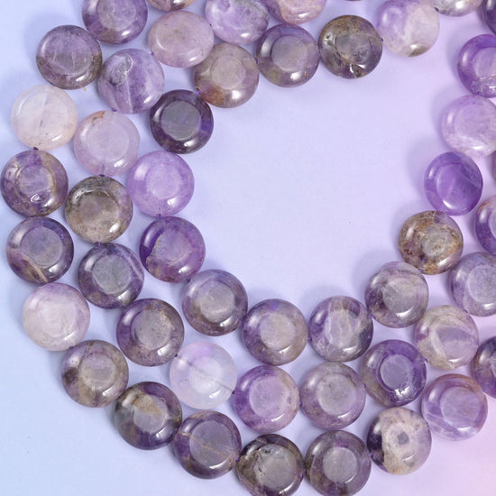 Looped Amethyst coin strand with milky white and deep purple zones