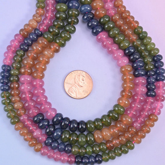 Tourmaline Color Dyed Jade smooth rondelle beads, a colour-blocked strand running from olive green through deep navy, bright rose pink and warm peach