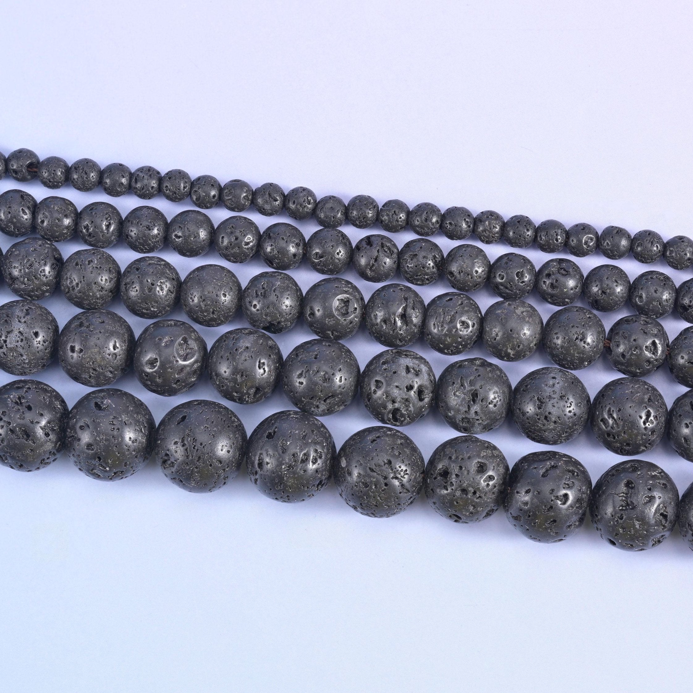 Lava rock round beads, approximately 47 beads per 15 inch strand
