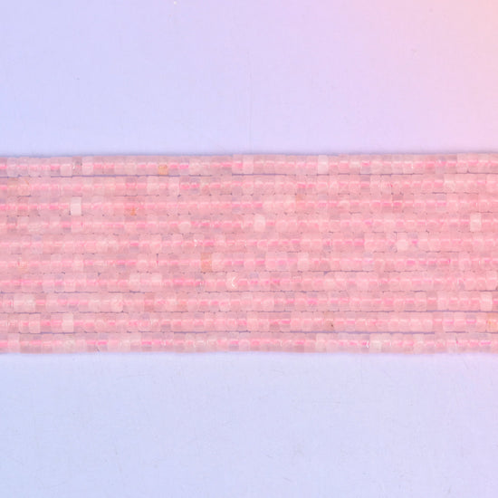 Rose Quartz Smooth Heishi Disc Beads in soft to vivid pink with a translucent glow