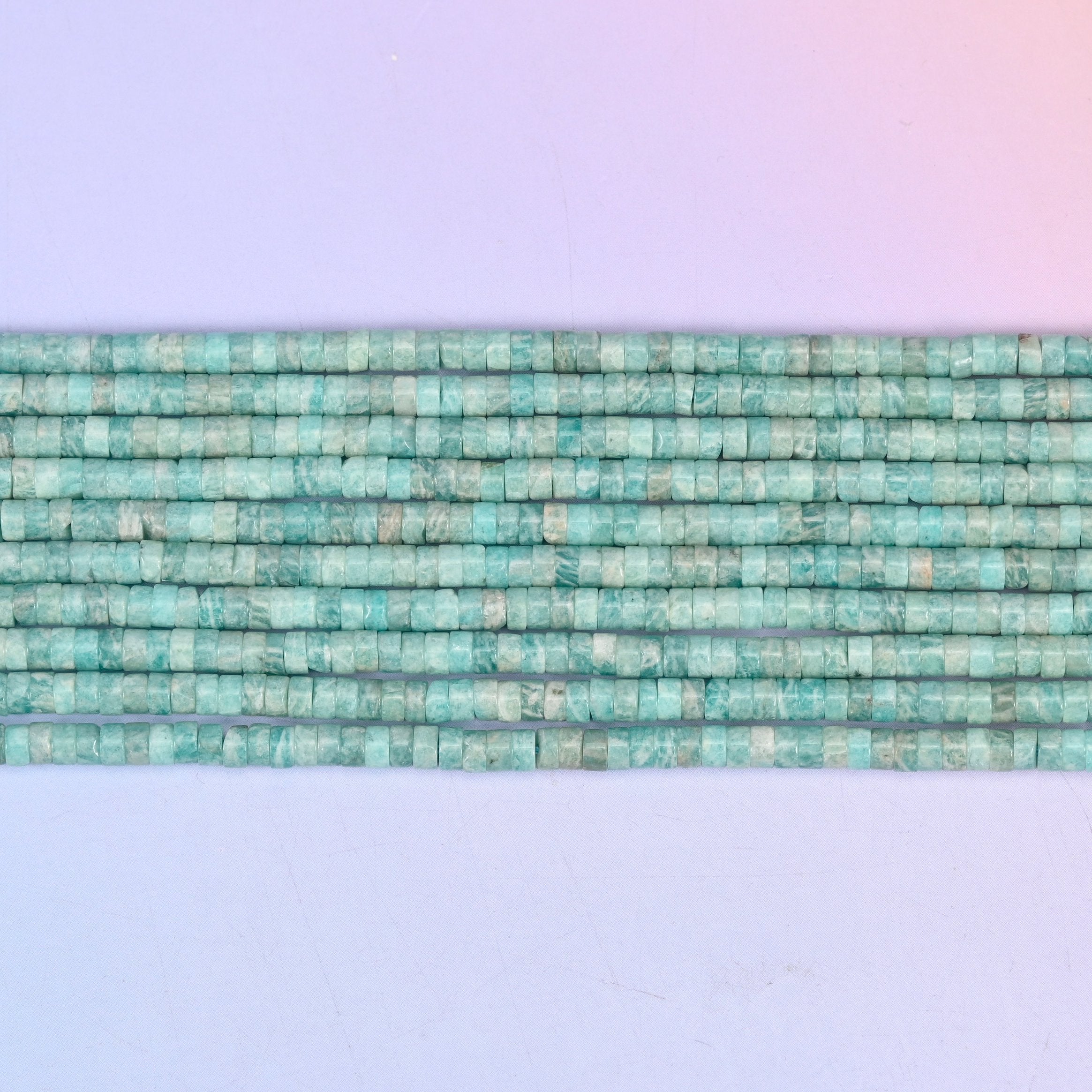 Blue Amazonite Smooth Heishi Disc Beads 2x4mm in seafoam to teal blue with white marbling