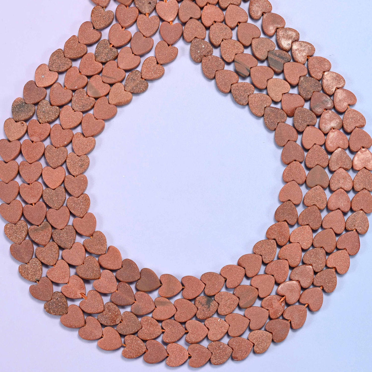 Matte gold sandstone flat heart beads, hole 0.8mm