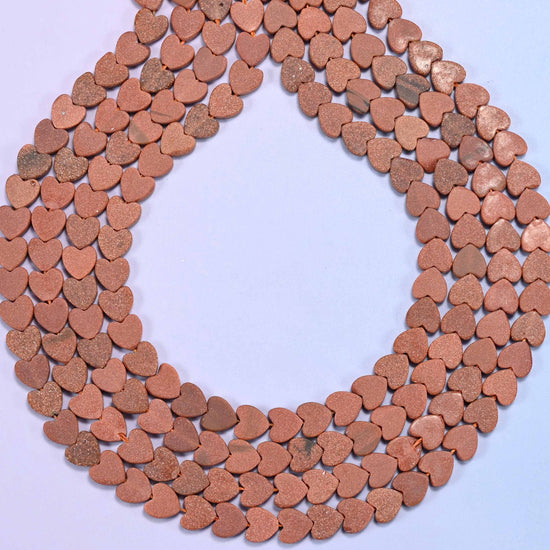 Matte gold sandstone flat heart beads, hole 0.8mm