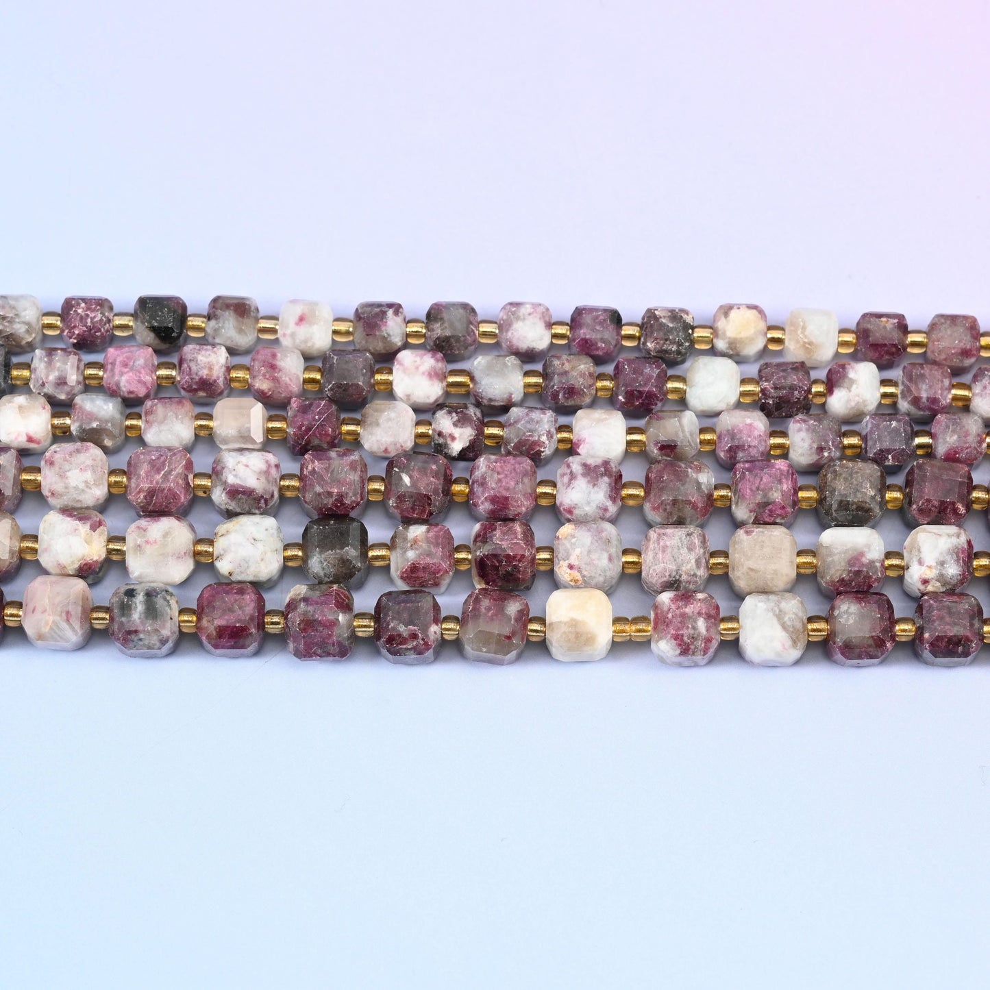 Plum Tourmaline beads in dusty mauve and plum with cream and grey speckling