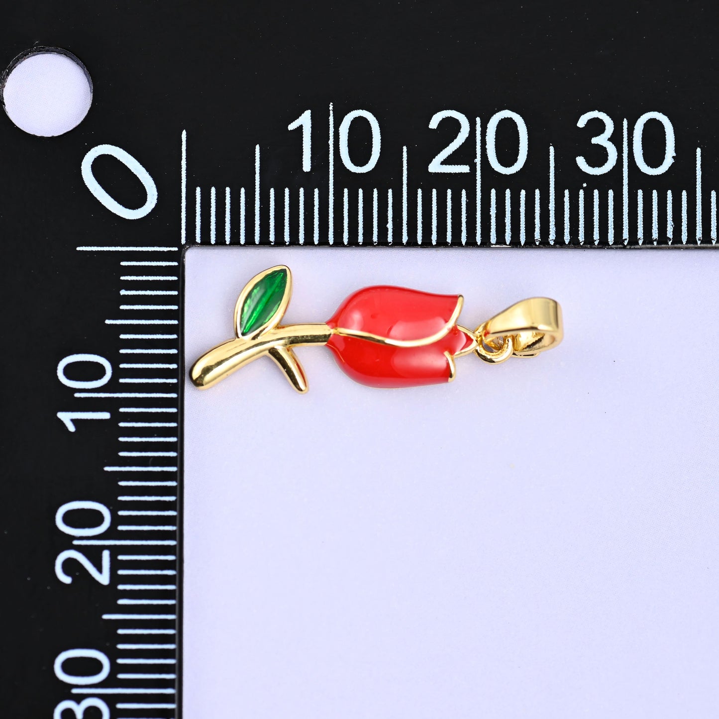 Enamel tulip charms, red 18K gold plated flower pendant shown from the side with its flat fold-over bail