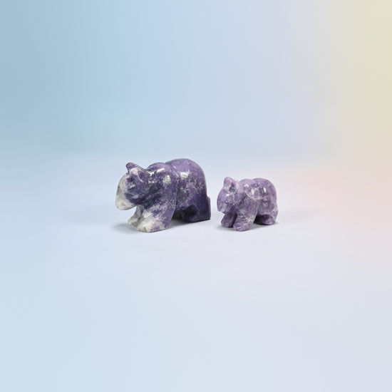 A 2 inch and a 1.5 inch lepidolite bear crystal carving, purple natural stone with white patches