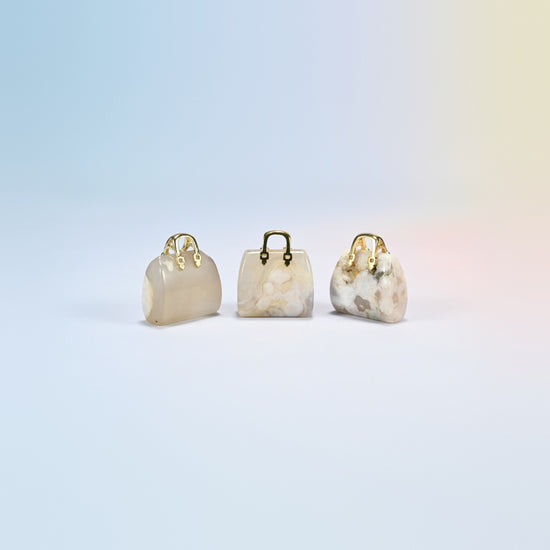Three sakura agate purse crystal carvings, 1 inch, cream natural stone with pink flower patterns, gold-tone handle