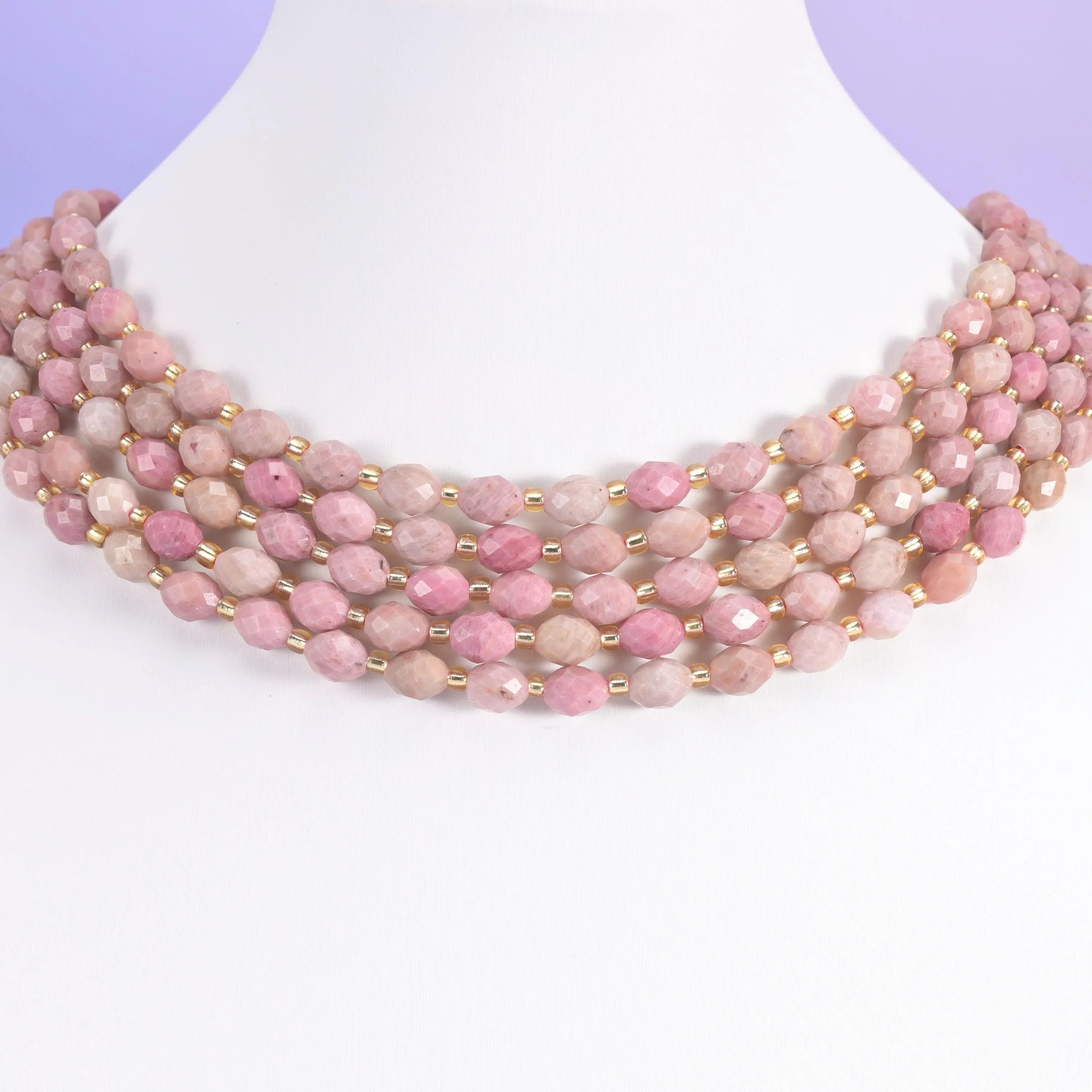 Pink Rhodonite beads, faceted rice barrel, 6x8mm