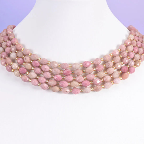 Pink Rhodonite beads, faceted rice barrel, 6x8mm