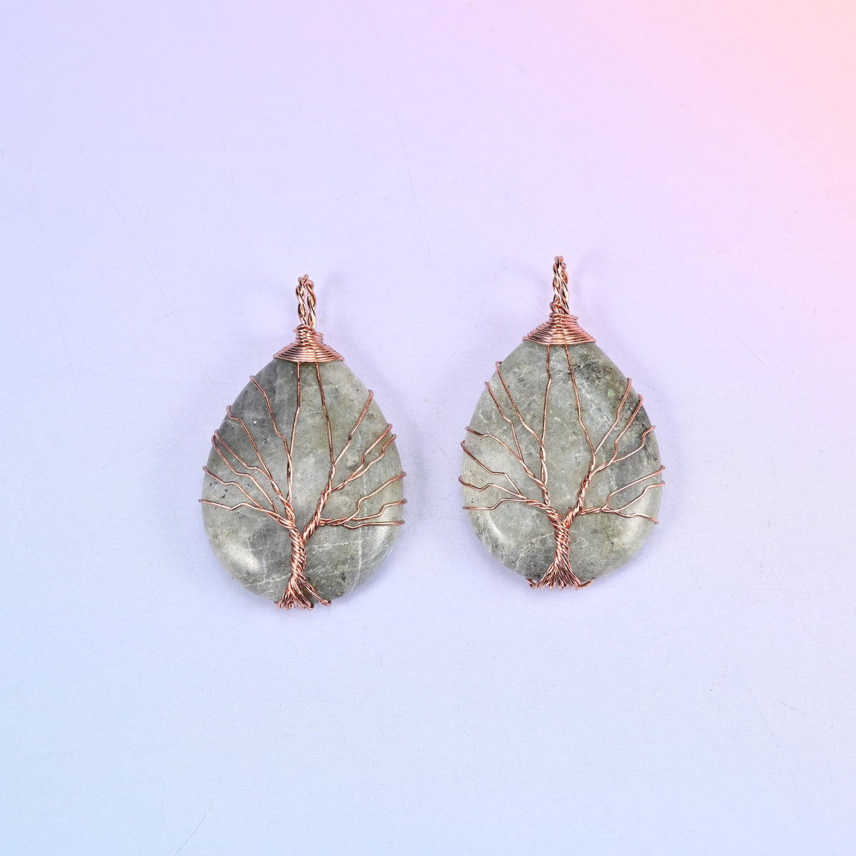 Teardrop Crystal Pendant with Copper Wired Tree in grey-green moss agate, a pair with the cloudy mottling of the stone visible through the wire.
