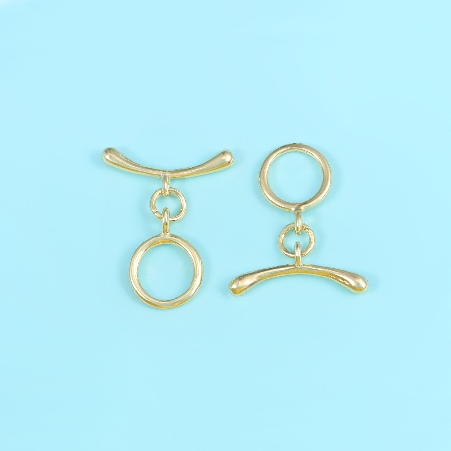 18K gold filled curve bar toggle clasp with a gently curved, tapered bar