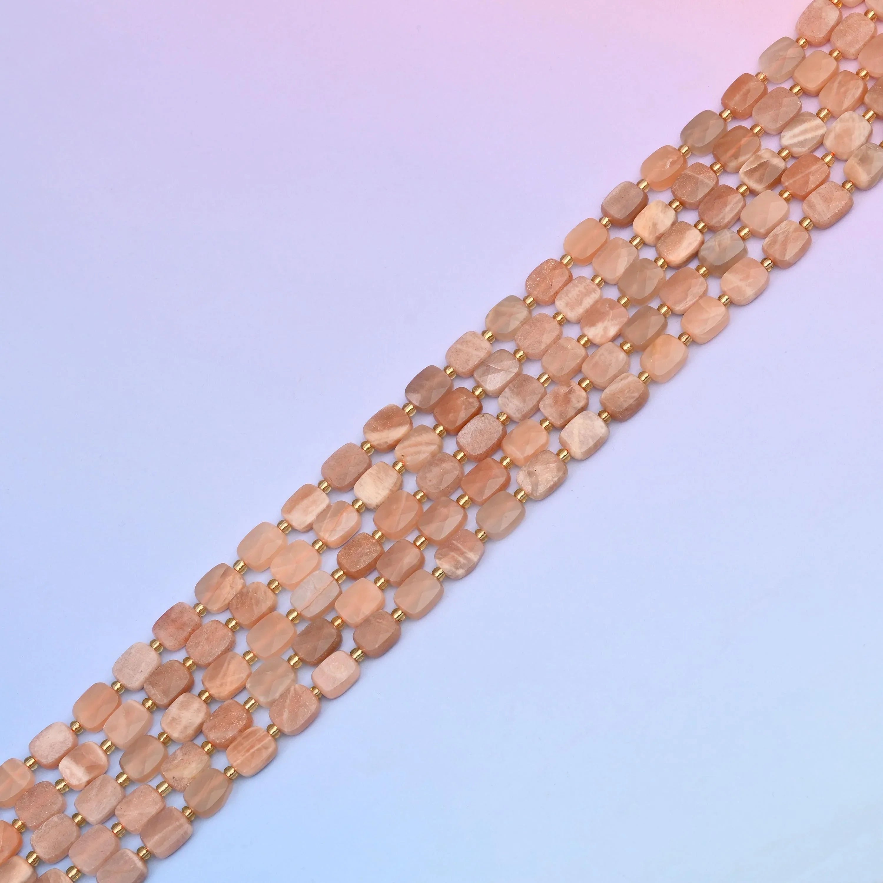 Sunstone beads in warm peach and soft apricot tones