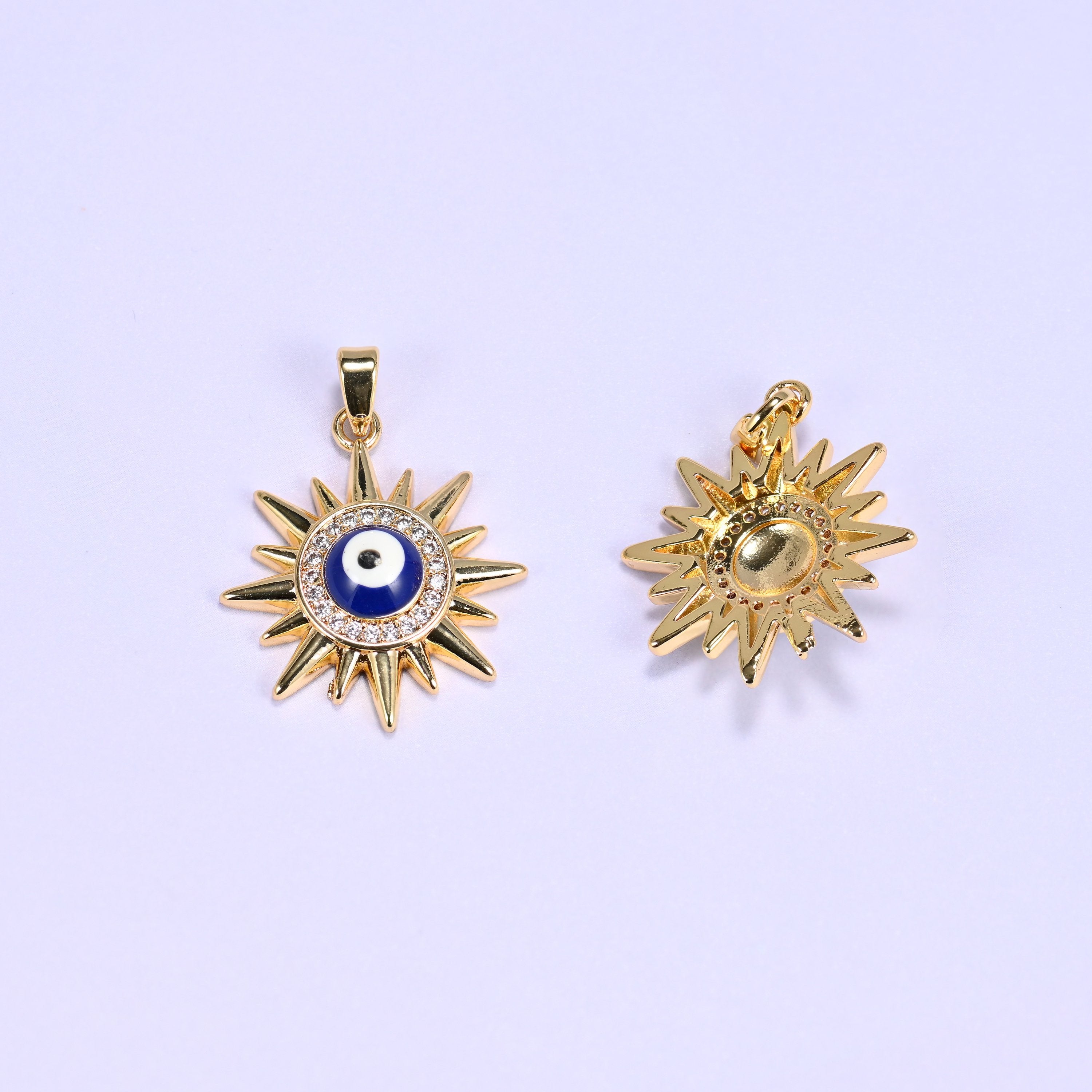 Evil Eye Sun Zircon Charms with a clear zircon halo