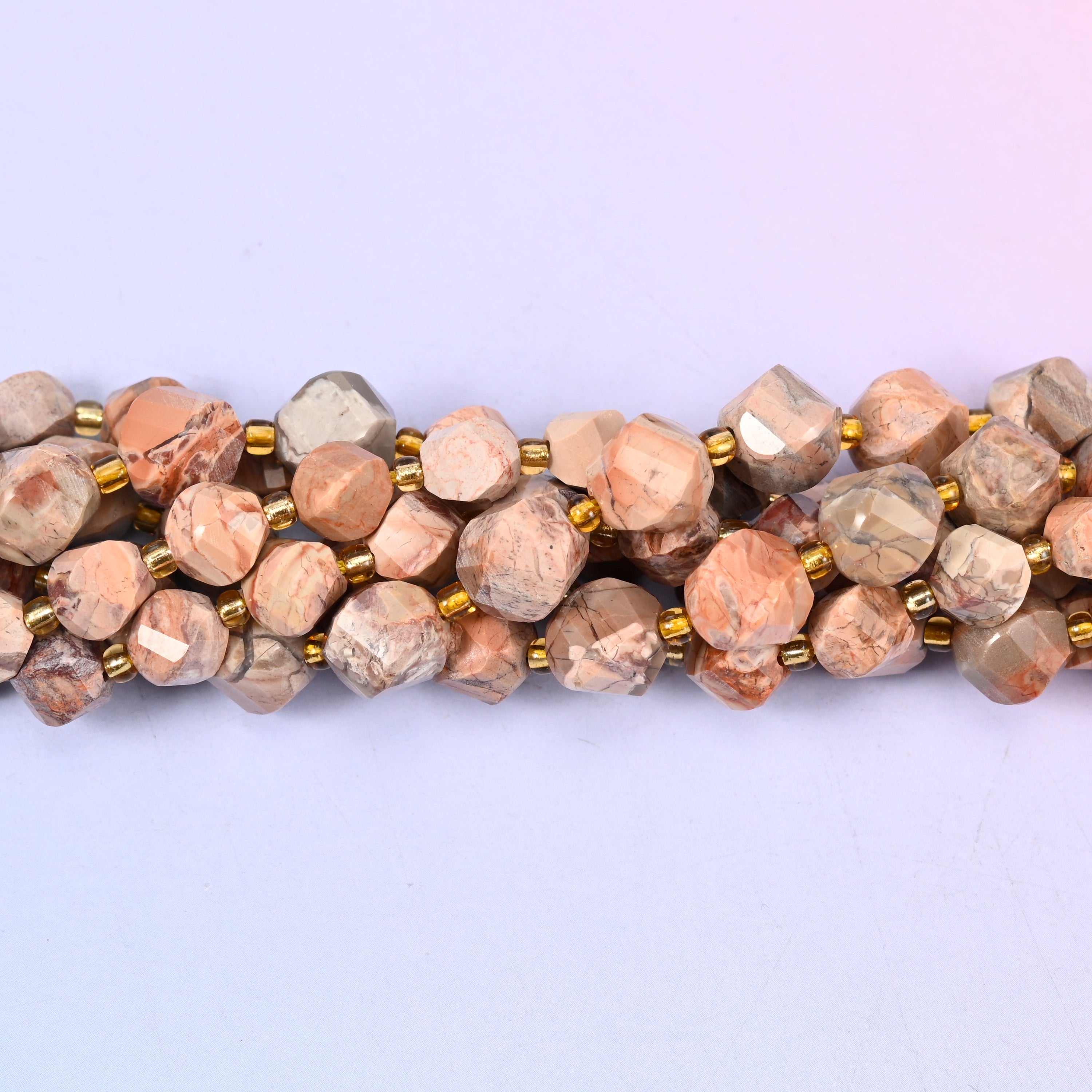 Red Howlite Faceted Spiral Twist Beads, warm peachy terracotta and soft beige marbled with fine grey veining