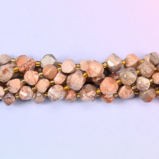 Red Howlite Faceted Spiral Twist Beads, warm peachy terracotta and soft beige marbled with fine grey veining