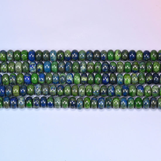 Natural Phoenix Lapis Rondelle Beads in deep blue and moss green with pyrite flecks.