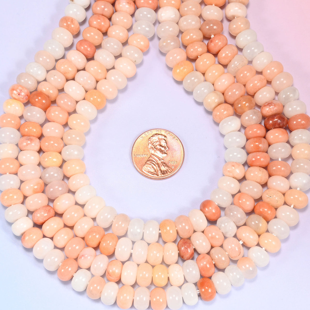 Natural Pink Aventurine Rondelle Beads, full strand of approximately 72 beads.