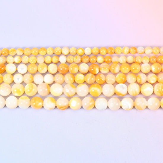 Yellow Pearl Shell Round Beads, 14 inch strand