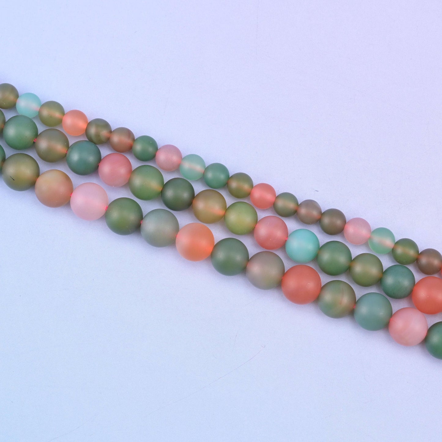 Green Yanyuan Agate Matte Round Beads in muted olive, coral, aqua and cream