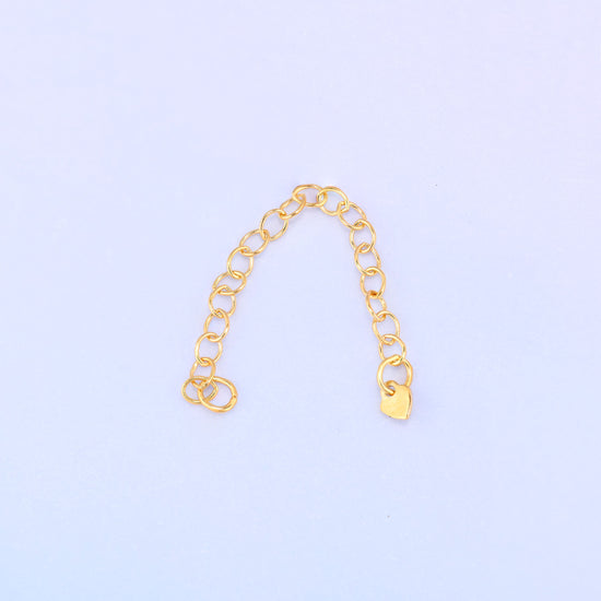 14K gold filled heart chain extender arranged in an arch, jump ring loop on one side and heart charm on the other.