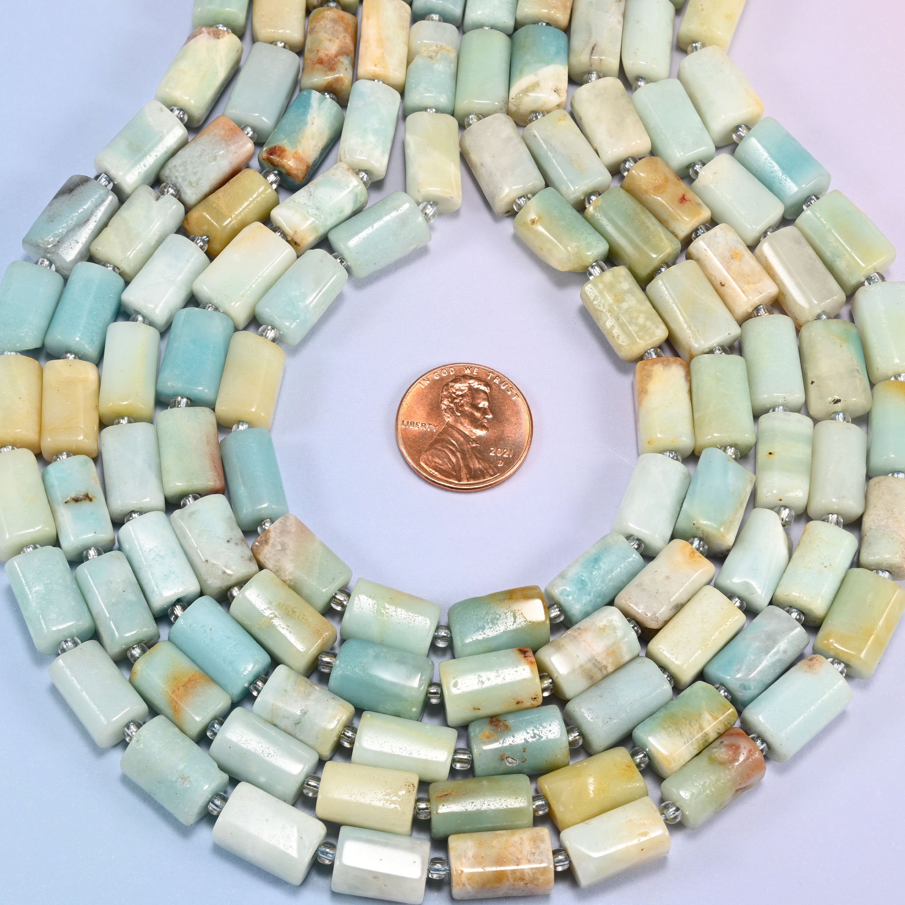 Multi-Color Amazonite faceted tube beads in a teardrop coil, 12x8mm tubes cut and polished by hand so no two match exactly