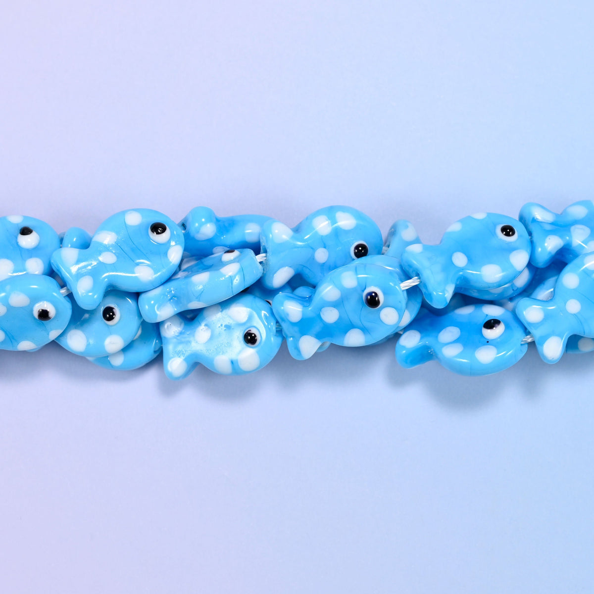 Sky Blue with White Dot Fish Glass Beads, a round-bellied fish in glossy opaque sky blue with white dots