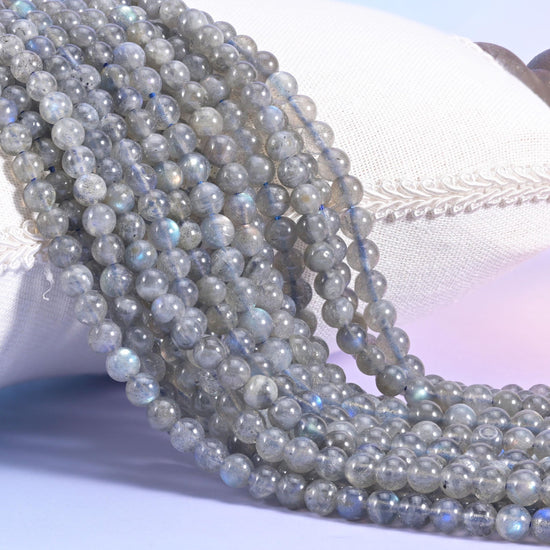 White Labradorite Smooth Round Beads, pale smoky grey with a cool blue flash