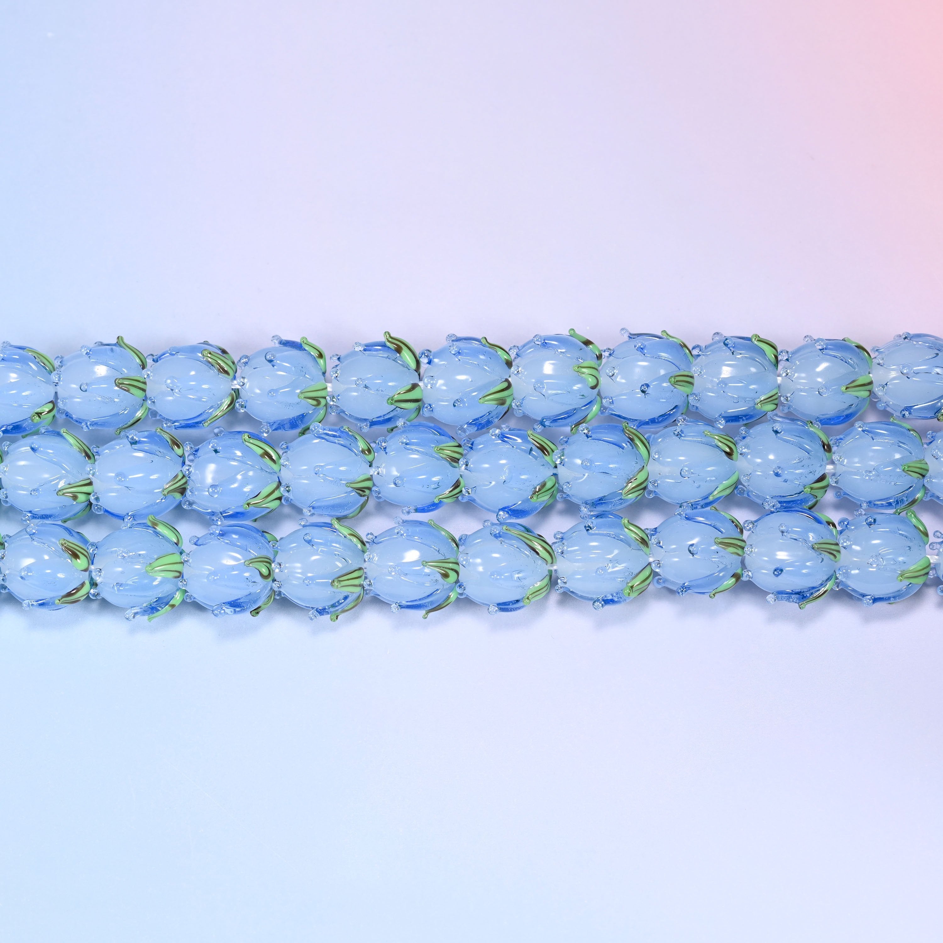 Blue Tulip Flower Bud Lampwork Glass Beads 14mm in blue with green leaf detail