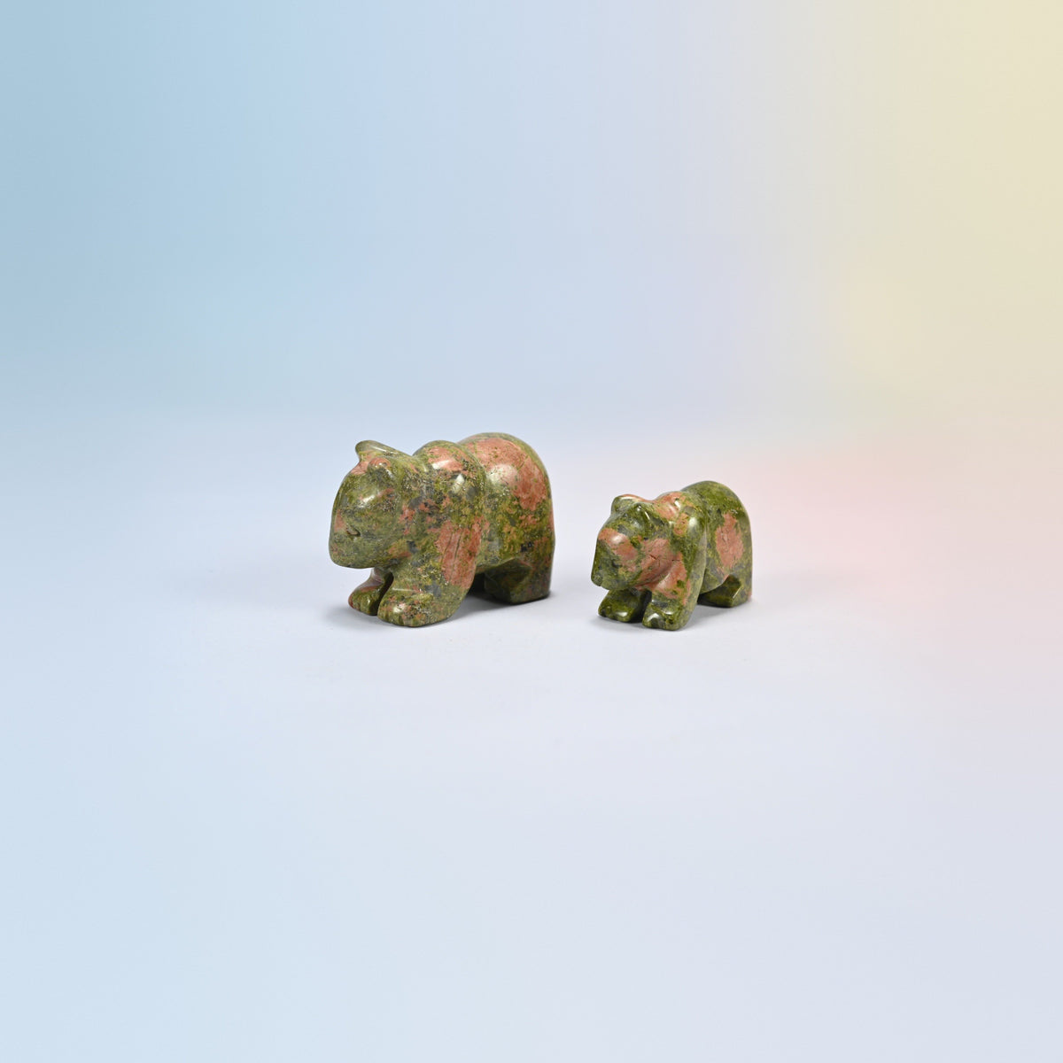 A 2 inch and a 1.5 inch unakite bear crystal carving, green and pink natural stone