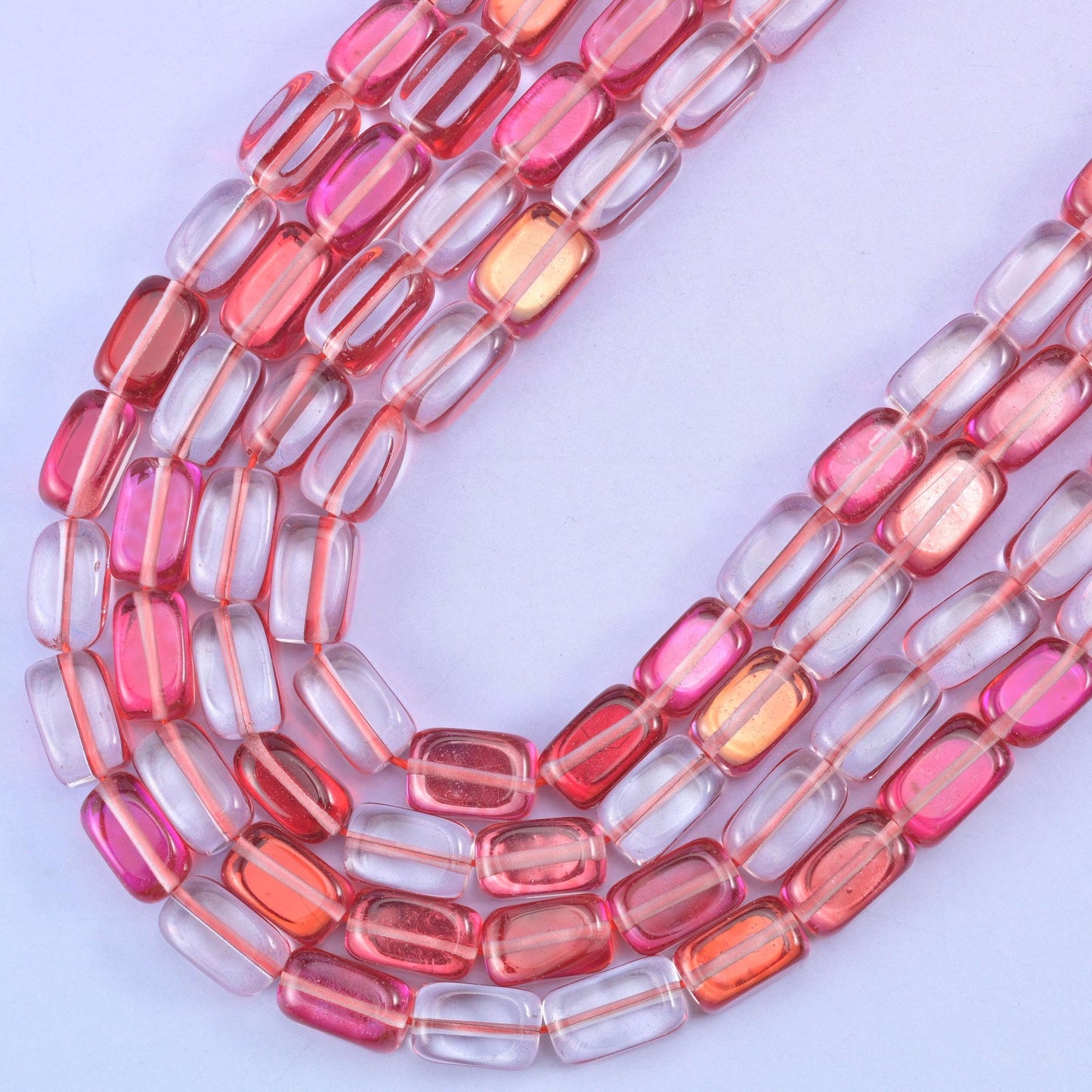 Red Mystic Aura glass beads, center-drilled approximately 1.0mm hole