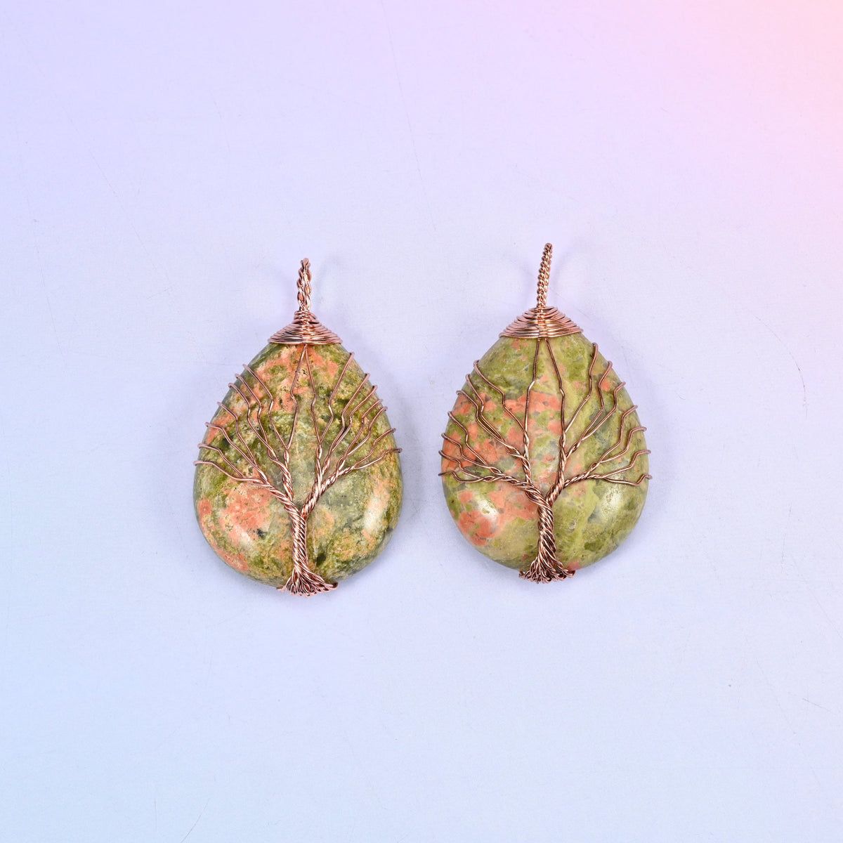 Teardrop Crystal Pendant with Copper Wired Tree in unakite, two pieces in olive green flecked with salmon pink.