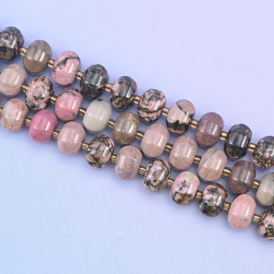 Rhodonite beads in soft pink with striking black matrix veining