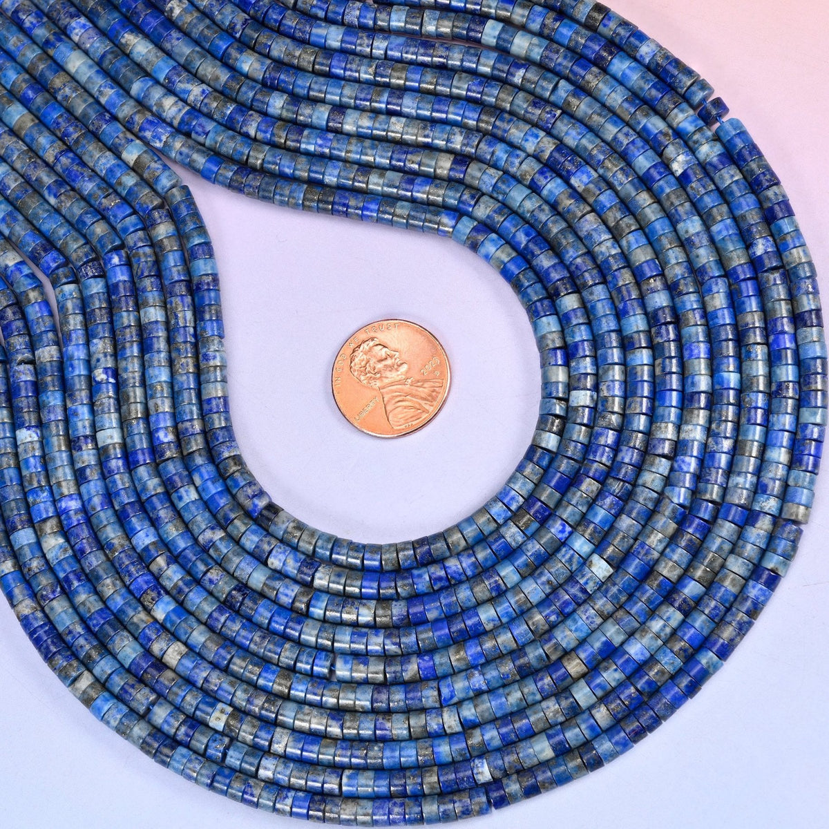Lapis Lazuli Smooth Heishi Disc Beads, approximately 180 beads per strand