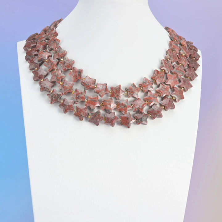 Red Sesame Jasper beads, faceted star shape, 14mm.