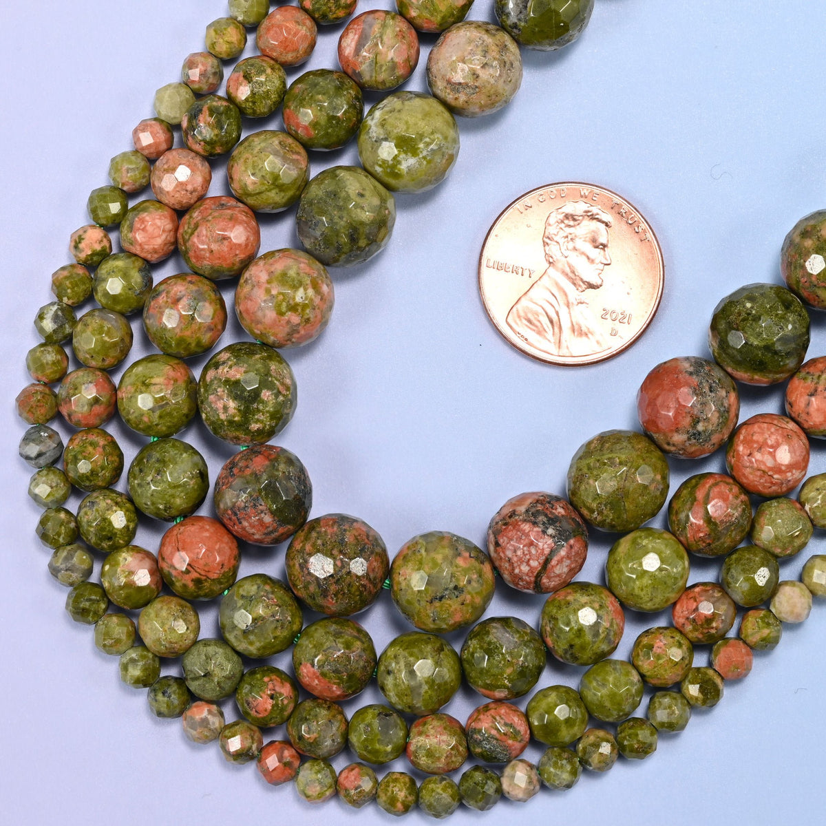 Faceted round cut unakite beads