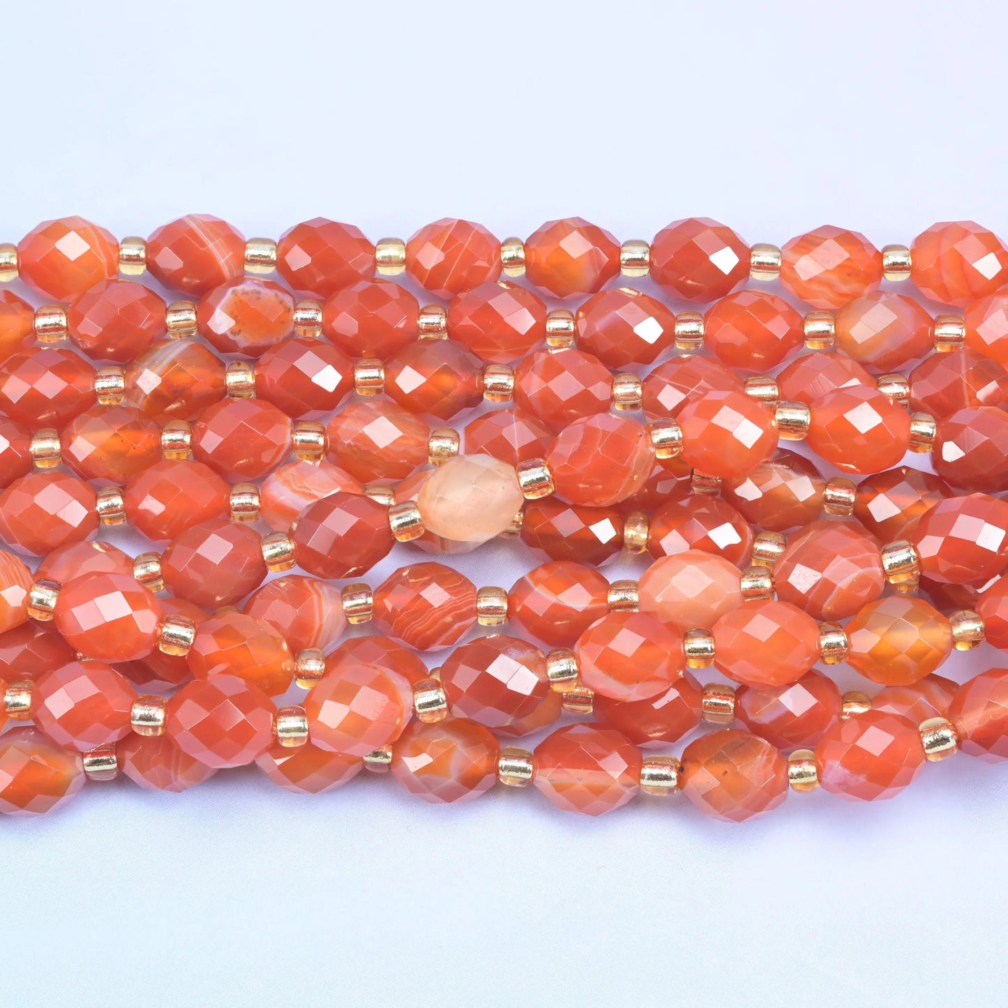 Faceted rice barrel cut dyed red stripe agate beads