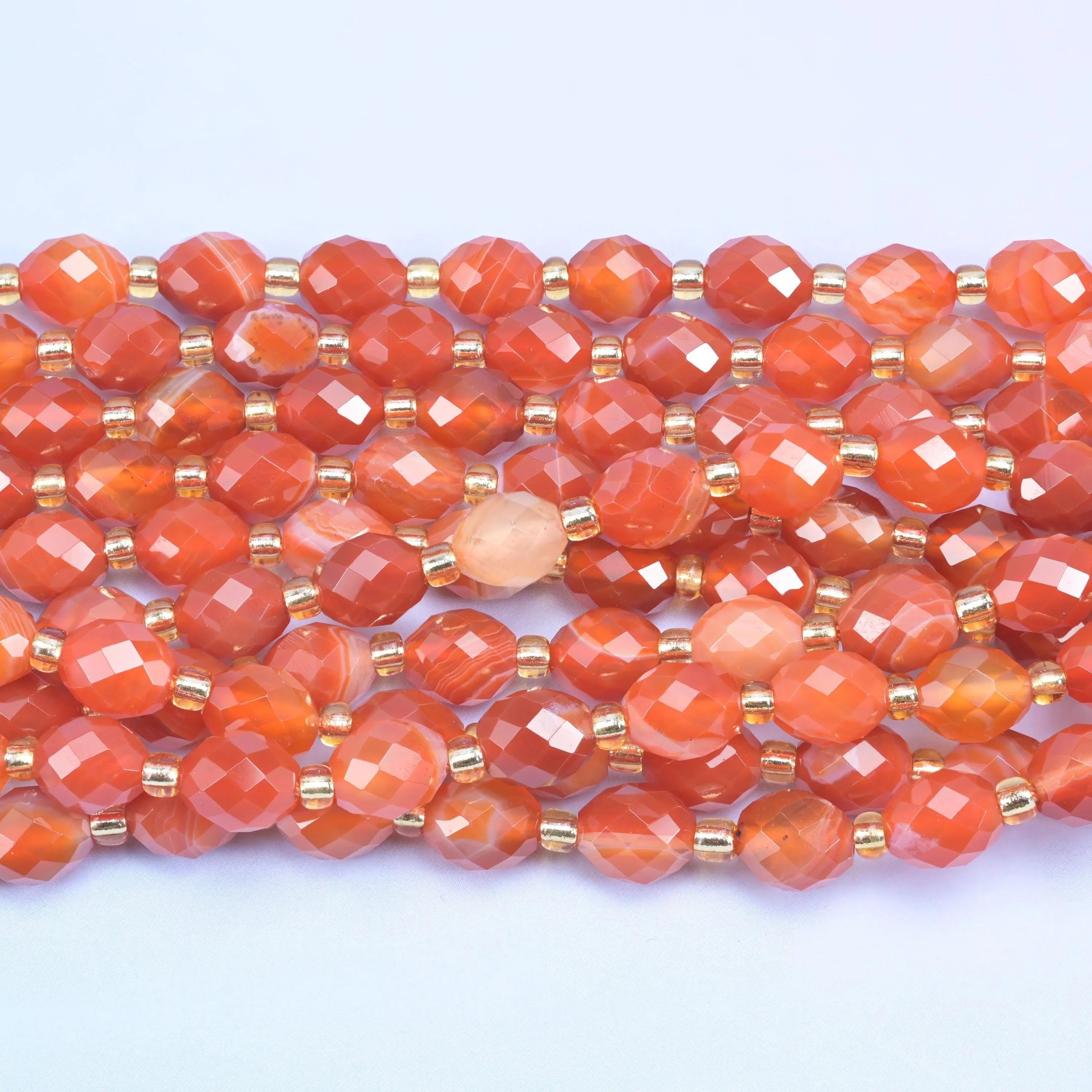 Faceted rice barrel cut dyed red stripe agate beads