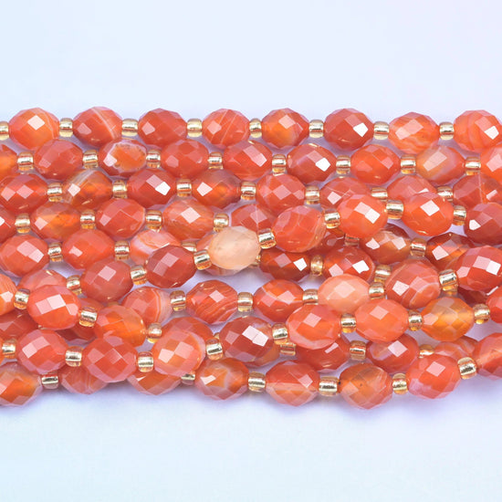 Faceted rice barrel cut dyed red stripe agate beads