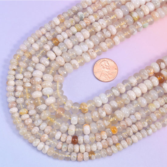 Sakura Agate smooth rondelle beads, 15.5 inch strand