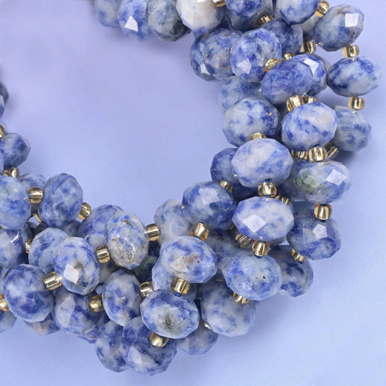 Faceted rondelle cut Blue Spot Jasper beads