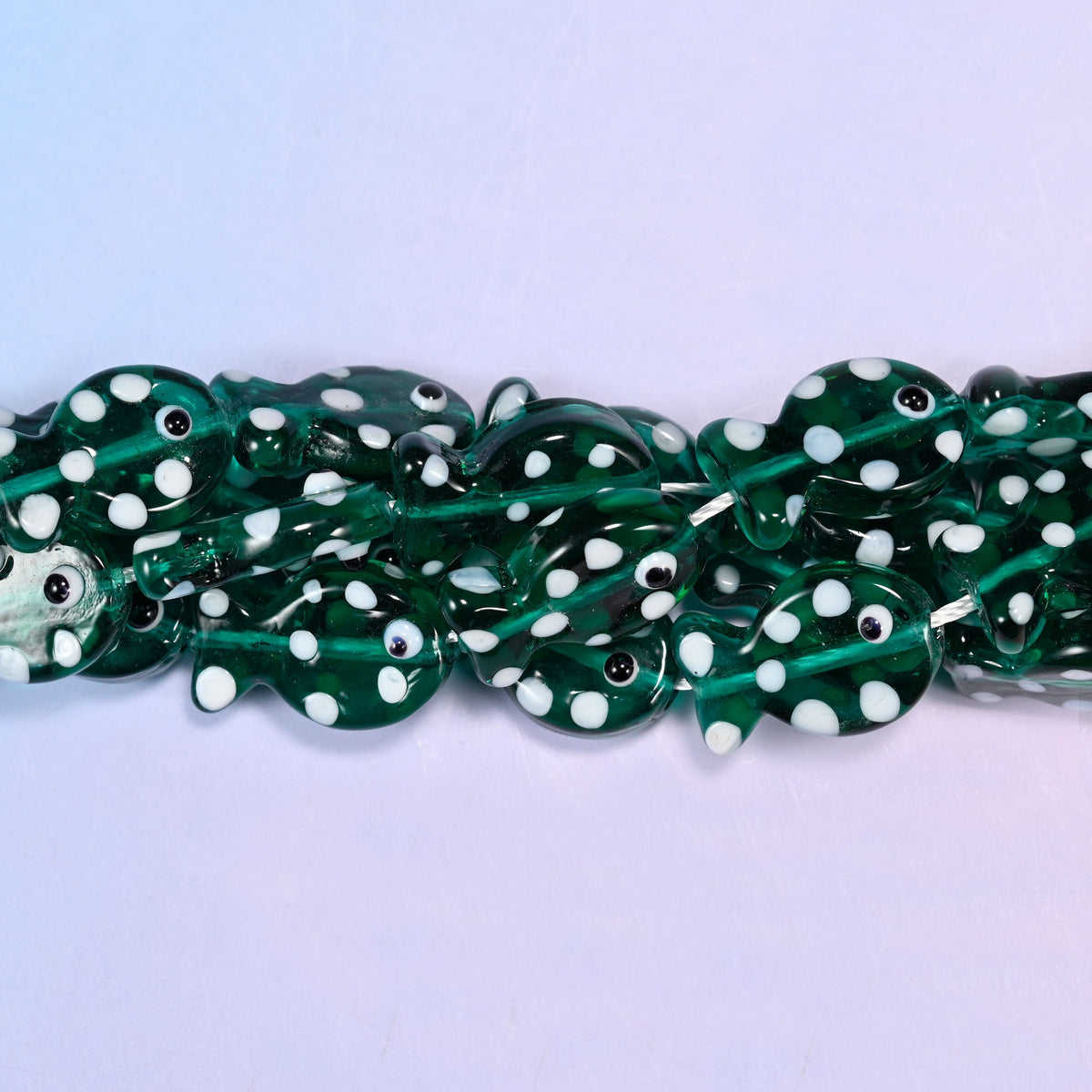 Transparent Jungle Green with White Dot Fish Glass Beads, 20 beads per strand