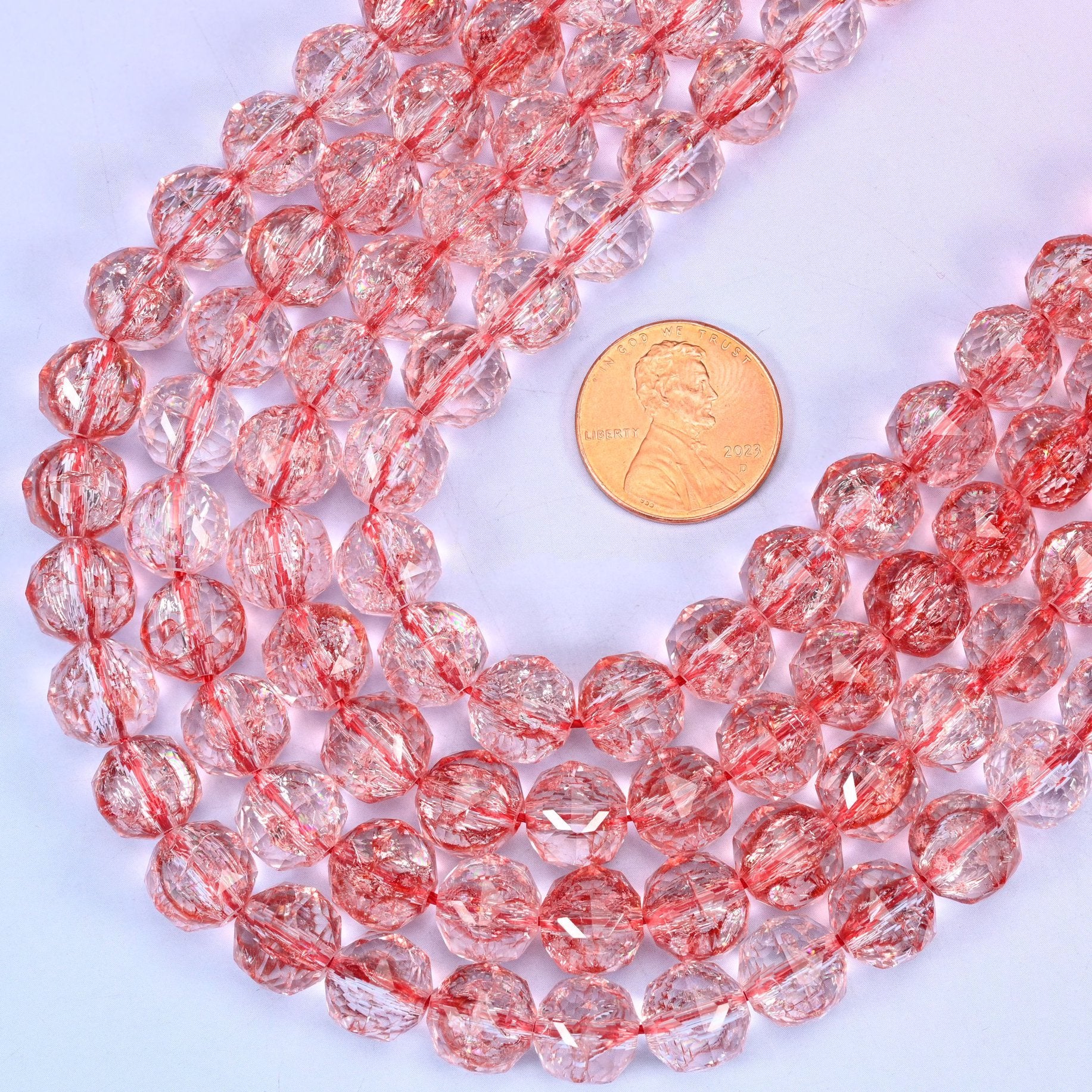 Faceted round cut transparent red glass beads